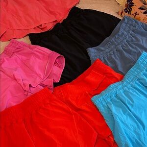 Lot of 7 Lululemon running shorts size 10 various colors